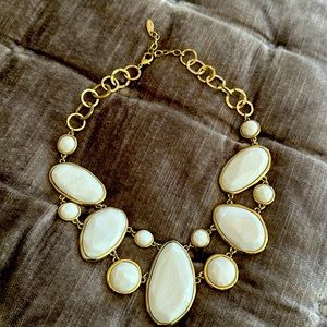 Gold and white necklace